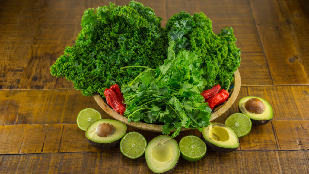 Kale Tacos! Massaged with lime & avocado in sprouted tortillas | cultivatorkitchen.com #vegan #recipe