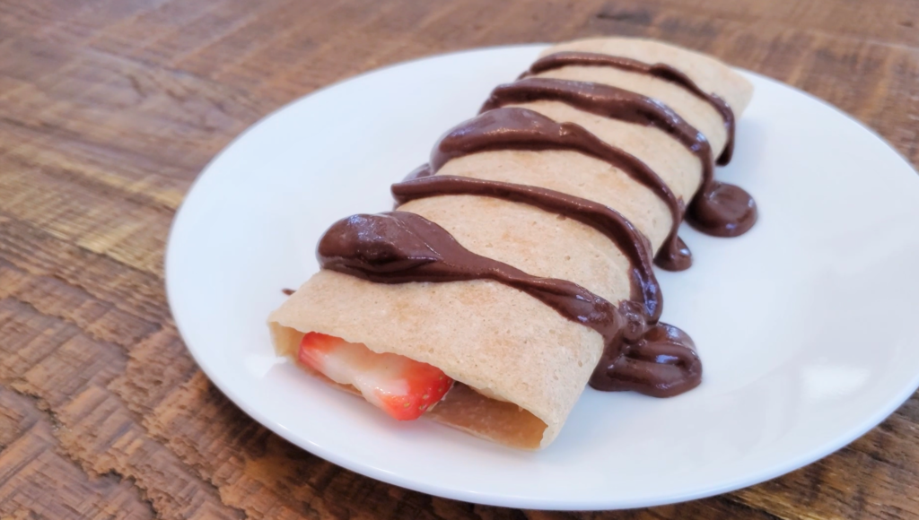Raw Vegan Strawberry Banana Crepes with Coconut Whipped Cream & Chocolate Sauce | CultivatorKitchen.com